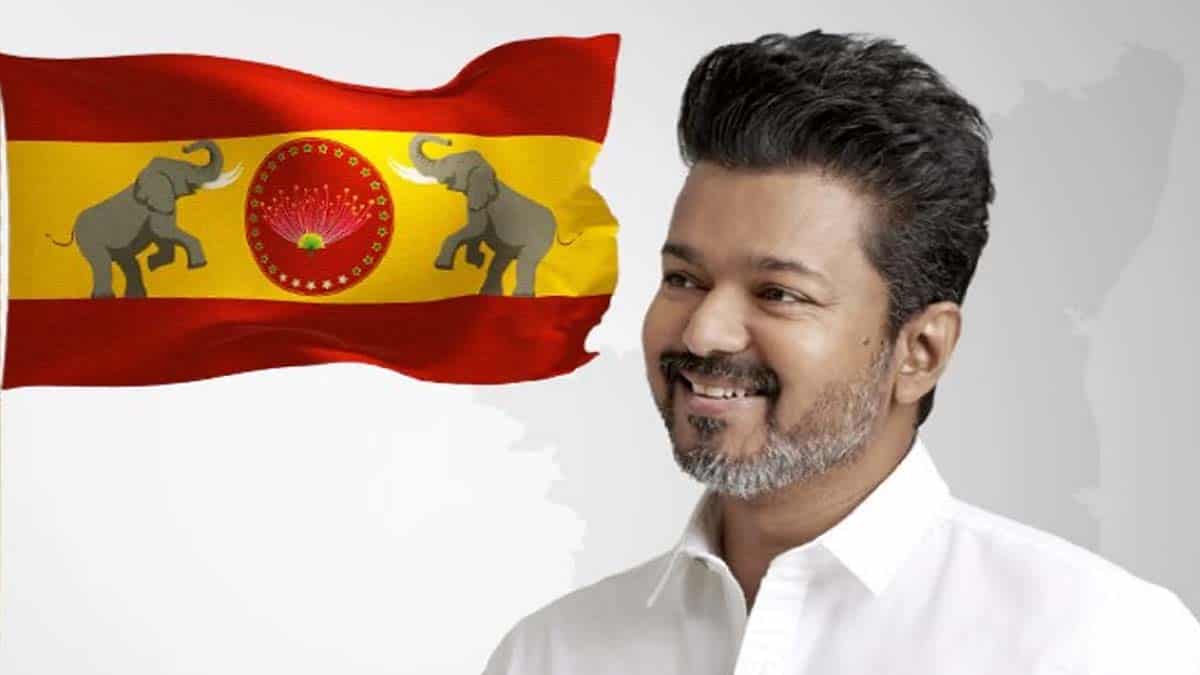 VIJAY WITH TVK FLAG 