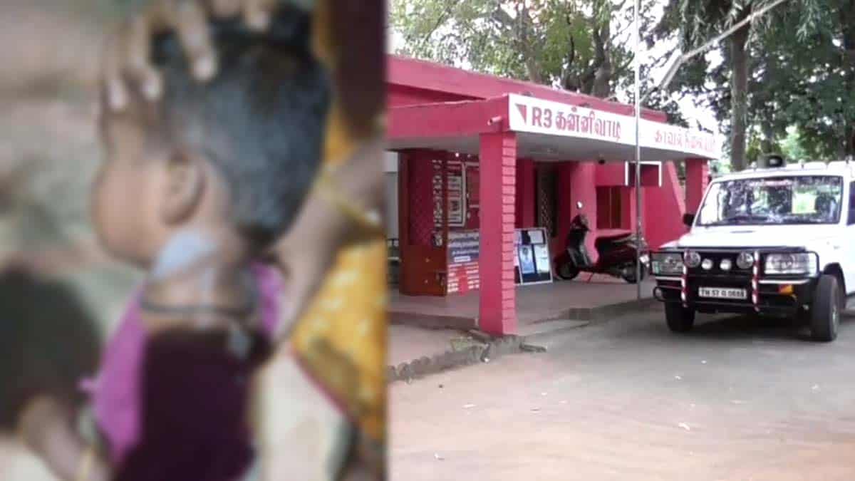 Anganwadi worker warming a child
